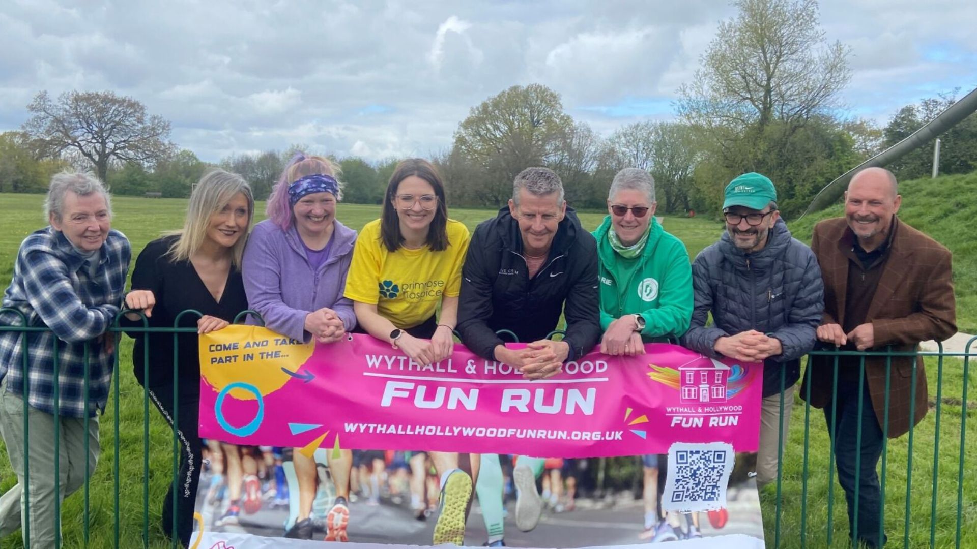 Steve Cram (centre) surrounded by run ambassadors and organisers of the Wythall Fun Run