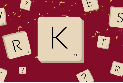 A large letter K in a tile with smaller tiles with various other letters