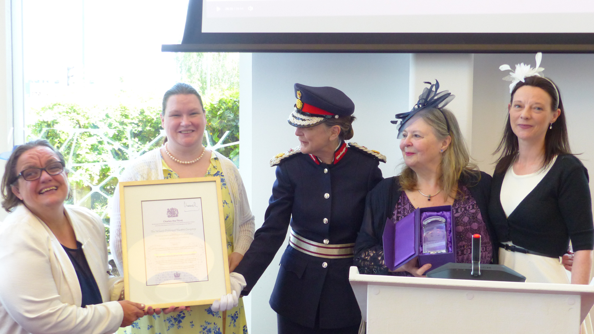 Pictured receiving the award from the Lord-Lieutenant: Sarah Baker, Hannah Carroll, Elaine Kirby and Eleanor Mouzer