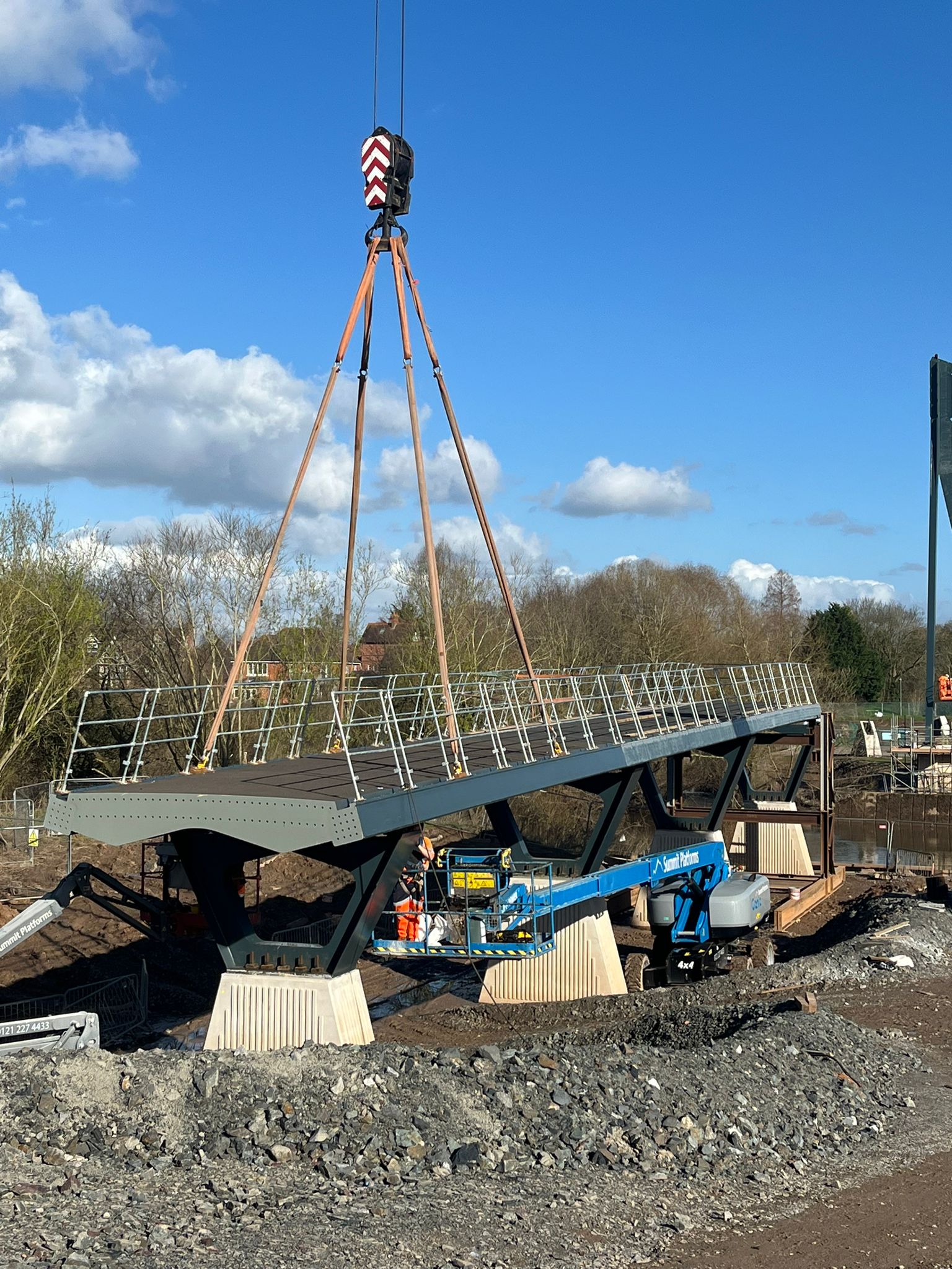 image of bridge being lifted into place