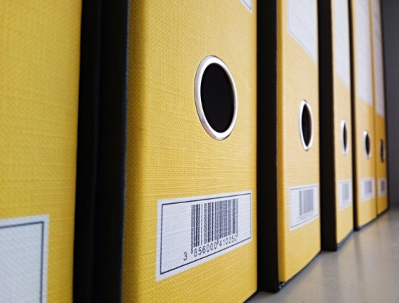 close up of yellow ring binder folders