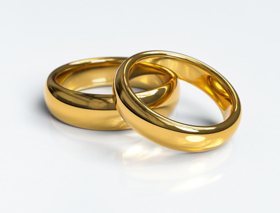 Two wedding rings on a table