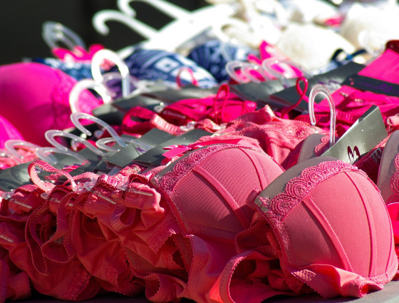 Bras laid out on a table.