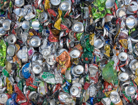 Many empty drinks cans waiting for recycling.