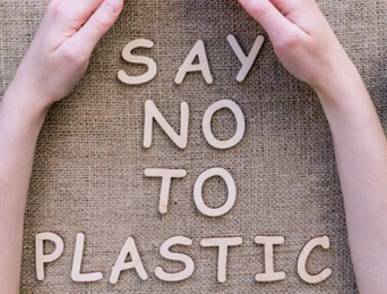 Say no to plastic written on a table