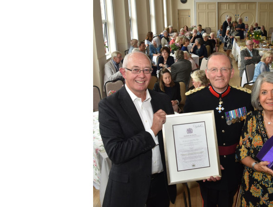 The then Vice Lord-Lieutenant Brigadier Roger Brunt, presenting the Queen’s Award for Voluntary Service to St George’s Hall in Bewdley, in 2021.