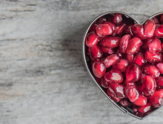Pomegranate seeds in a heart shape