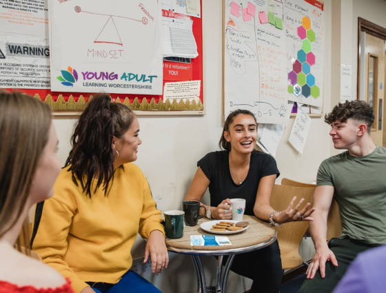 People chatting at a Young Adult Learning course