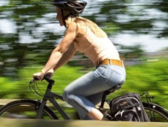 Cyclist riding bike