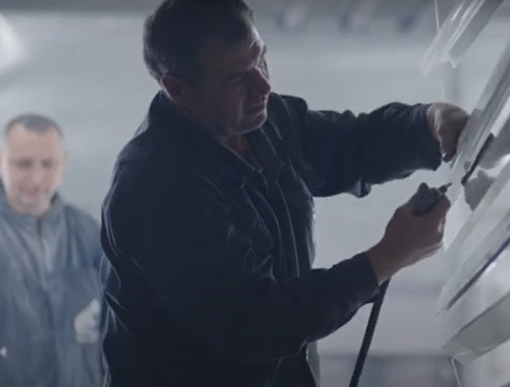 Worker cleaning some blinds