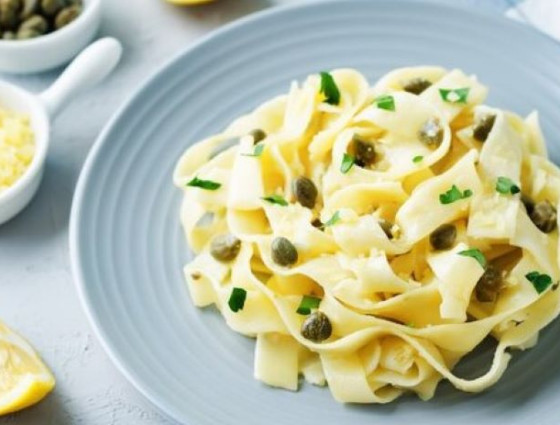 Bowl of pasta with capers sauce