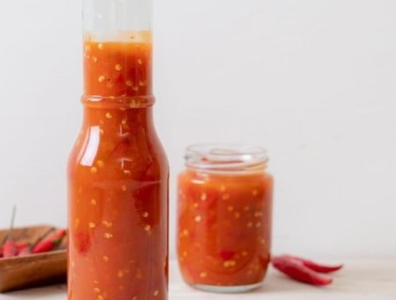 Jar & bottle of red sauce