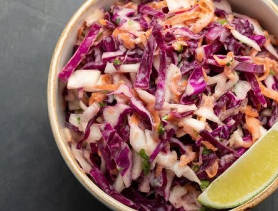 Bowl of coleslaw with purple & white cabbage