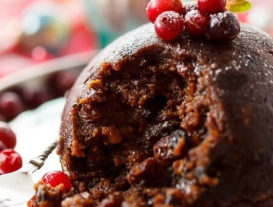 Christmas pudding decorated with cranberries