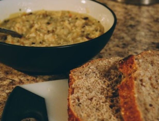 Bowl of Ribollita with slices of bread