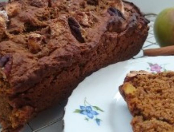 Cake with slice on plate on side