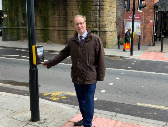 Councillor Marc Bayliss standing on Foregate St crossing