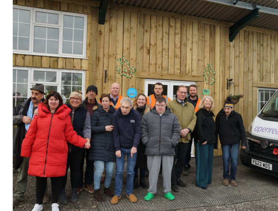 Residents of Jacks Place stand with Harriett Baldwin and Marc Bayliss