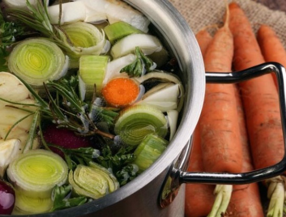 Bowl of vegetable peelings and tops