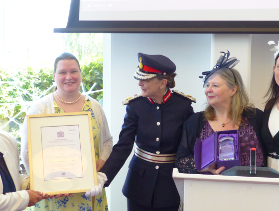 Pictured receiving the award from the Lord-Lieutenant: Sarah Baker, Hannah Carroll, Elaine Kirby and Eleanor Mouzer