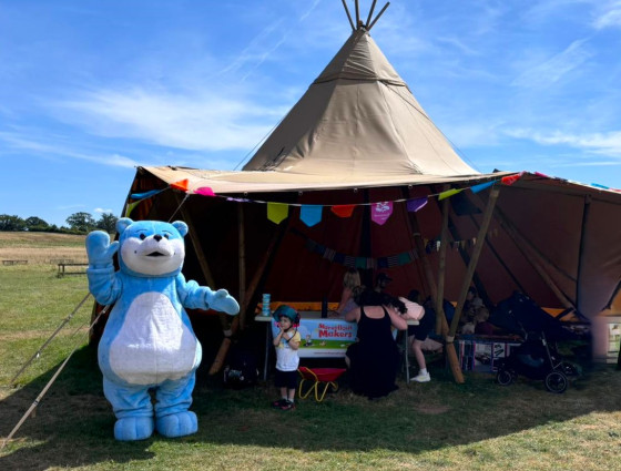 Bookstart Bear outside tent at Croome