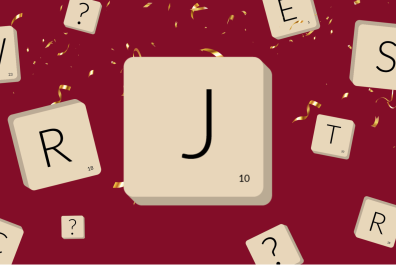 A large letter J in a tile with smaller tiles with various other letters