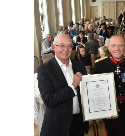 The then Vice Lord-Lieutenant Brigadier Roger Brunt, presenting the Queen’s Award for Voluntary Service to St George’s Hall in Bewdley, in 2021.