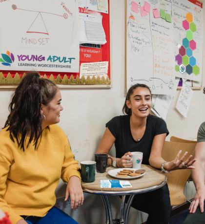 People chatting at a Young Adult Learning course