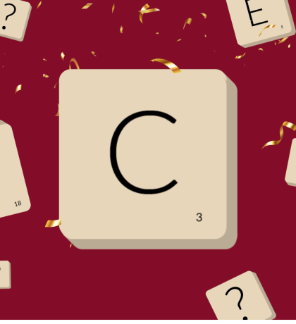 Large letter C on a tile surrounded by smaller tiles with various letters