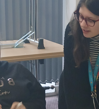 SEND Co-Production Officers chatting with a student