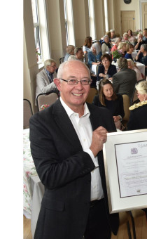 The then Vice Lord-Lieutenant Brigadier Roger Brunt, presenting the Queen’s Award for Voluntary Service to St George’s Hall in Bewdley, in 2021.