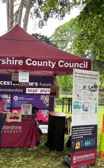 The WCC burgundy roadshow gazebo with banners and connect four game