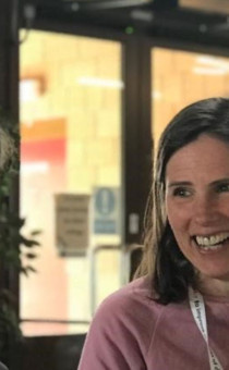 Two ladies chatting in a coffee shop