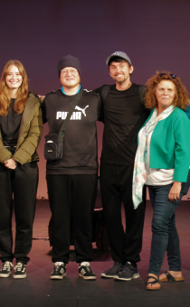 Get Safe Team standing on a theatre stay along with the actors and producers of their new play 'You In?'