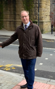 Councillor Marc Bayliss standing on Foregate St crossing