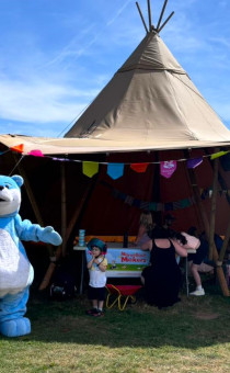 Bookstart Bear outside tent at Croome
