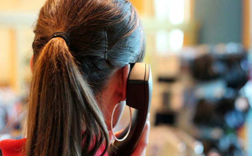 woman on a phone facing away